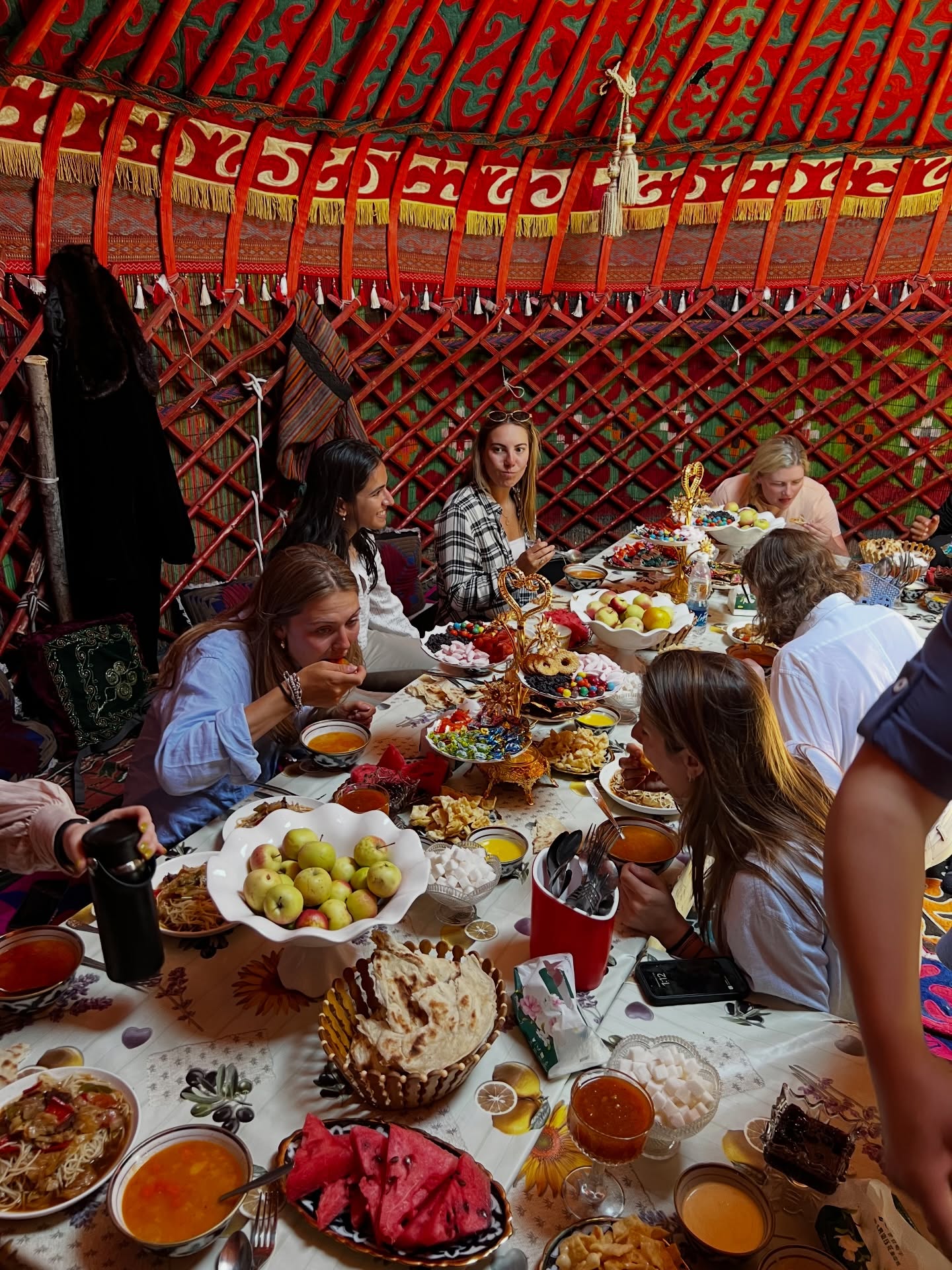 A meal laid out inside a yurt